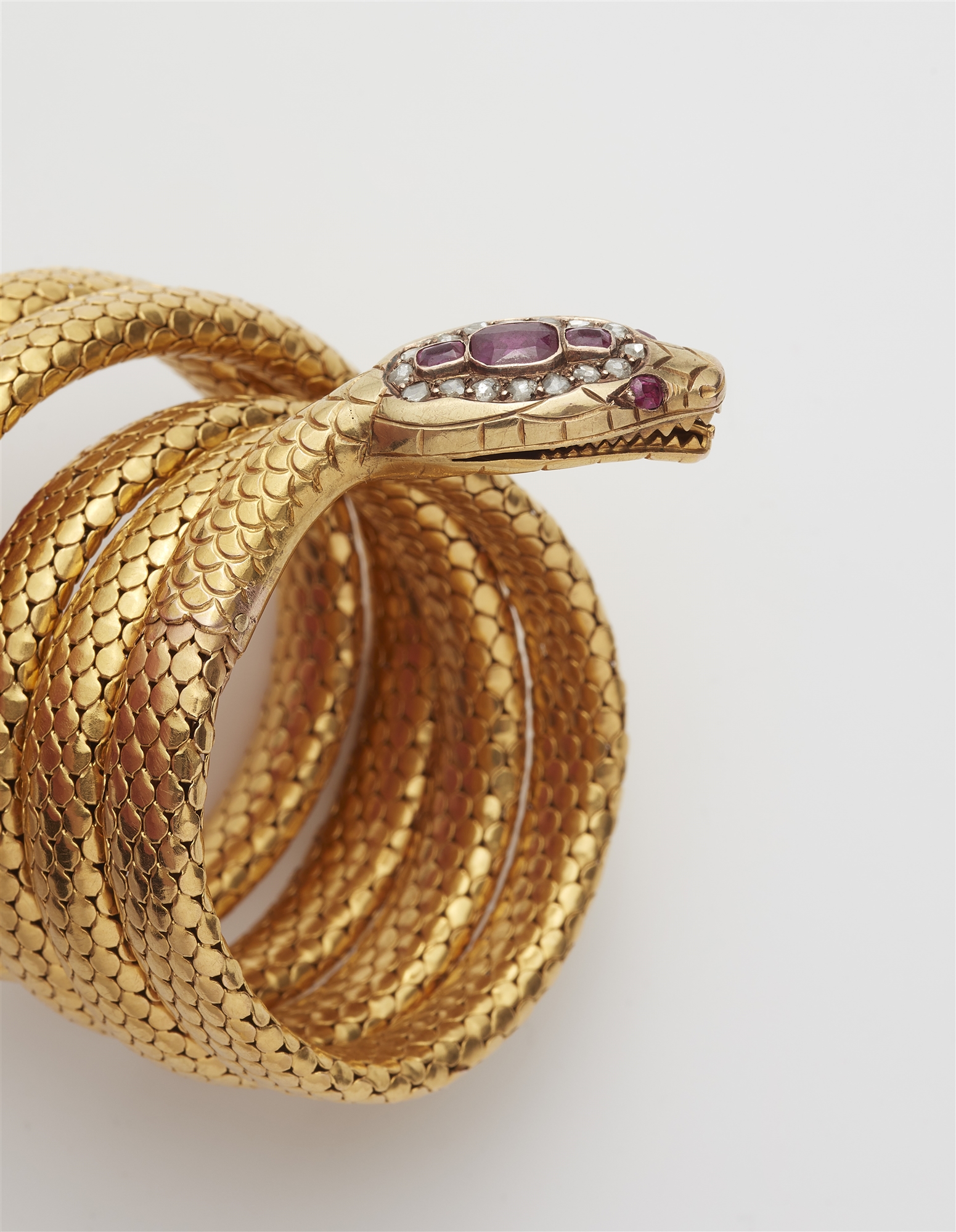 A French Art Nouveau 18k gold synthetic ruby and diamond tubogaz snake bangle. - Image 2 of 3