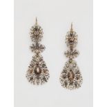 A pair of Flemish red gold filigree silver and diamond Baroque style earrings.