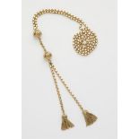An 18k gold sautoir necklace with tassels.