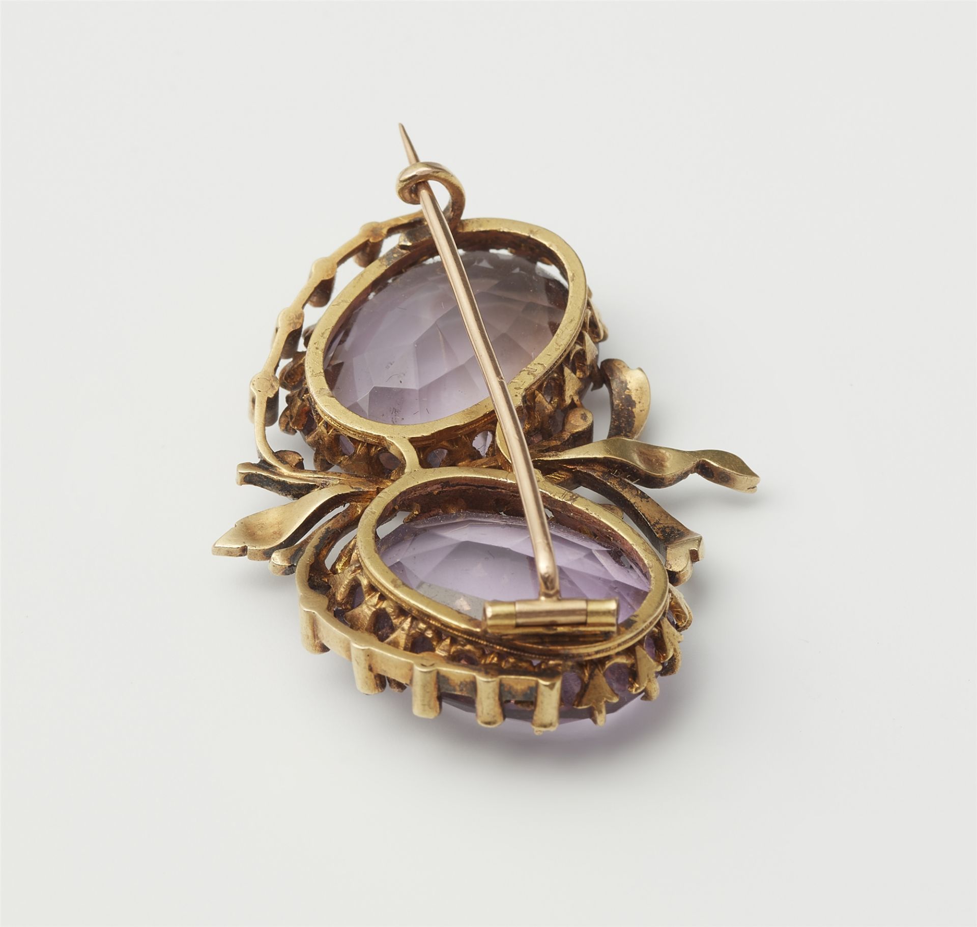 A late 19th century 14k gold, diamond and amethyst brooch. - Image 2 of 2