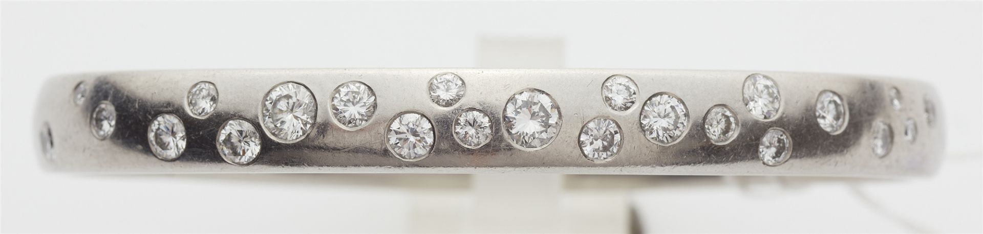 A German platinum and brilliant-cut diamond bangle. - Image 2 of 3