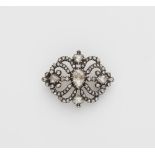 A silver 14k gold and foiled rose-cut diamond brooch.