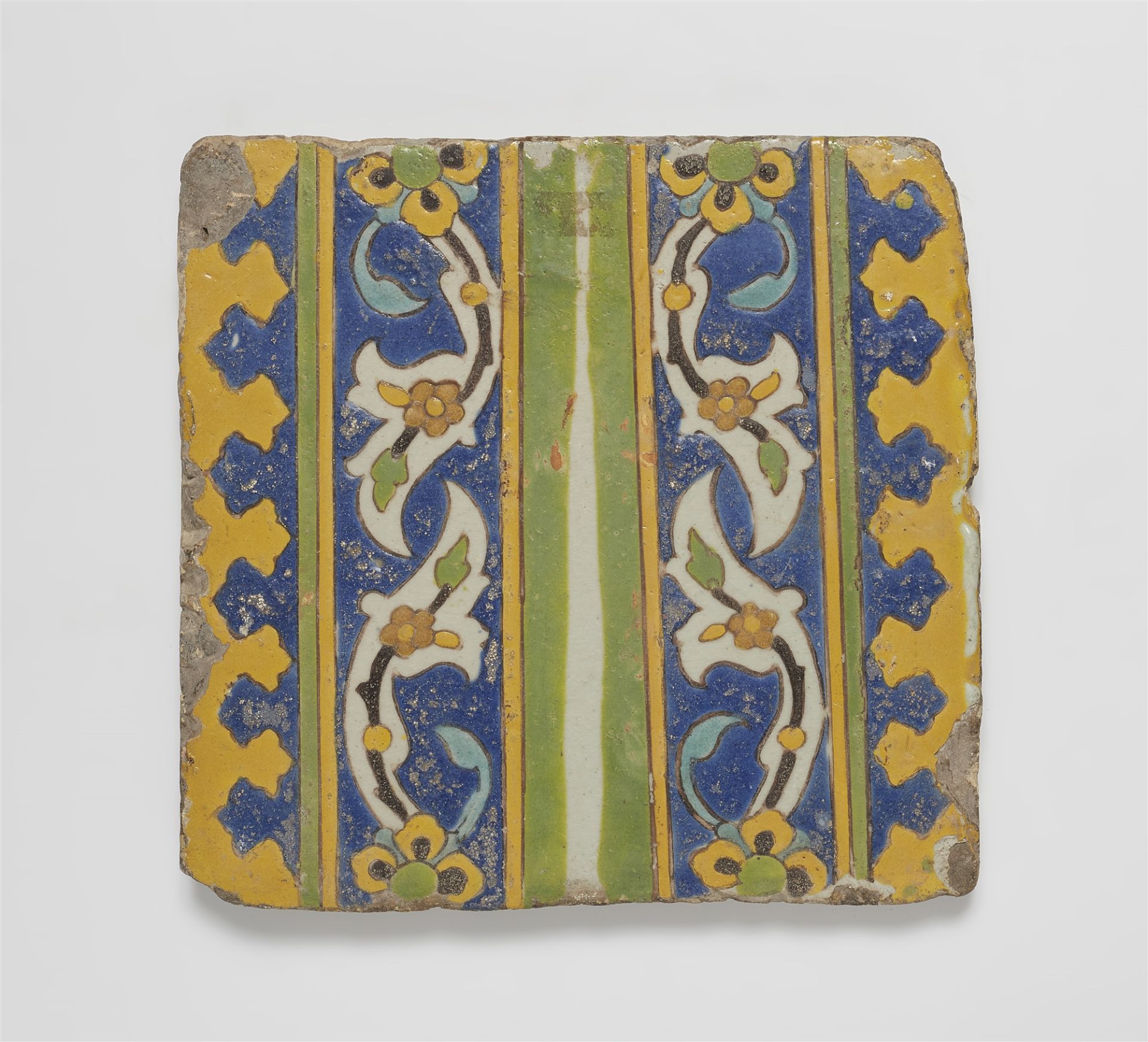 A Safavid tile with flowering tendril pattern