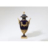 A magnificent heraldic porcelain vase in the manner of Sèvres