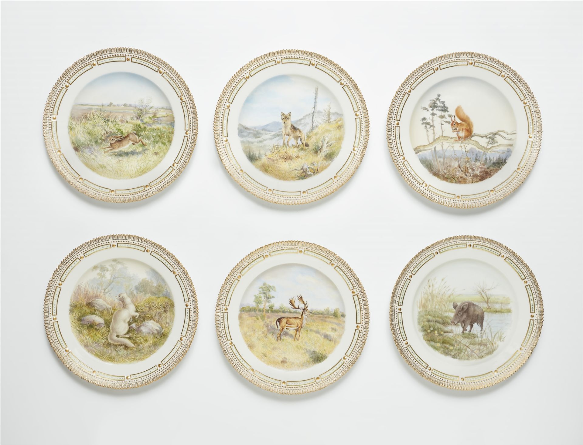 Six Royal Copenhagen porcelain dinner plates from a service with hunting motifs
