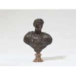 A bronze bust of a Roman Emperor (Hadrian?)