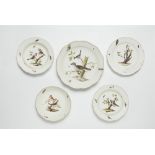 Three Meissen porcelain plates and two dishes from a dinner service with native birds