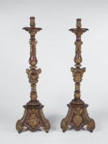 A pair of monumental Baroque candlesticks