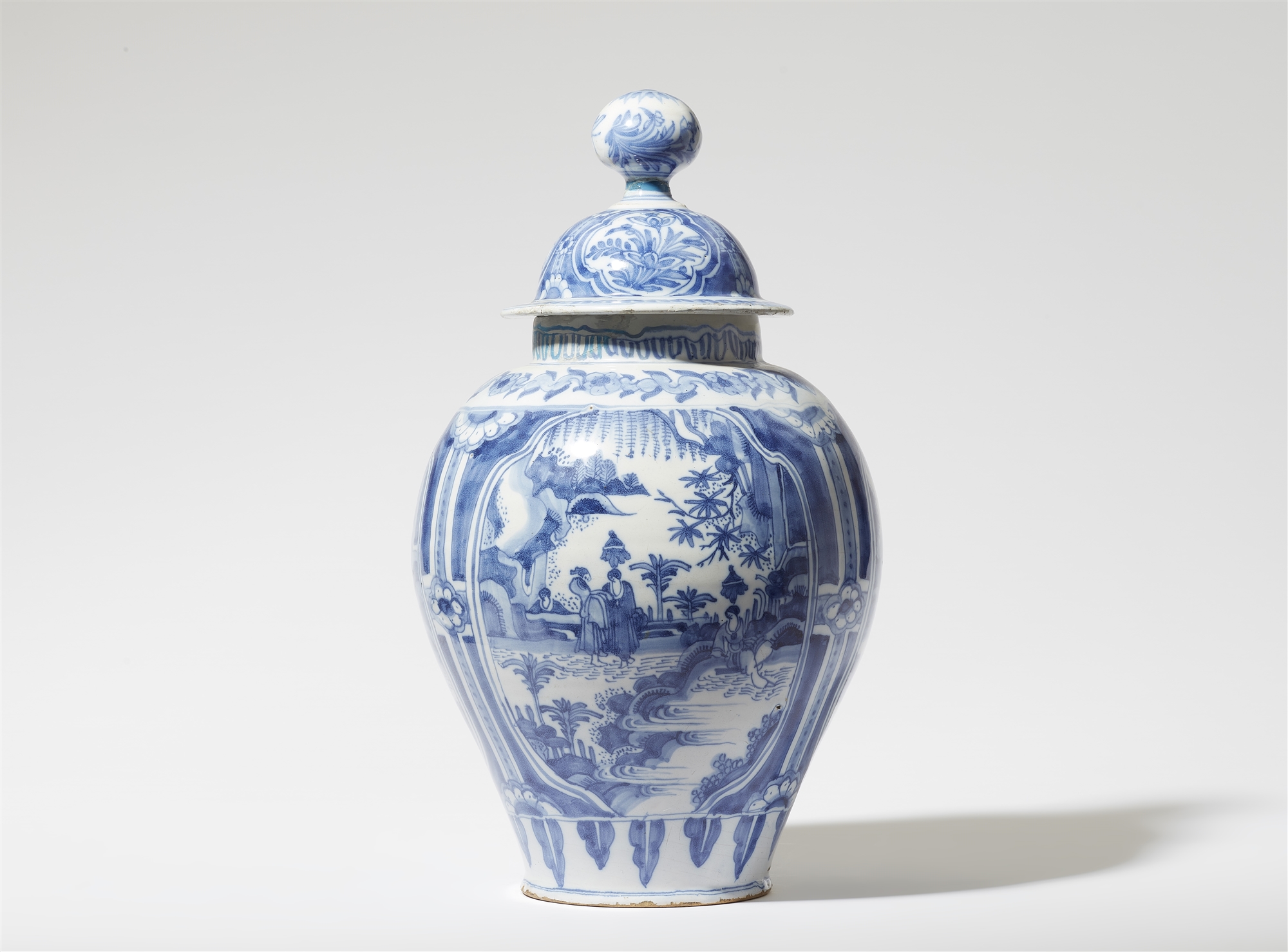 A faience vase and cover with Chinoiserie decor