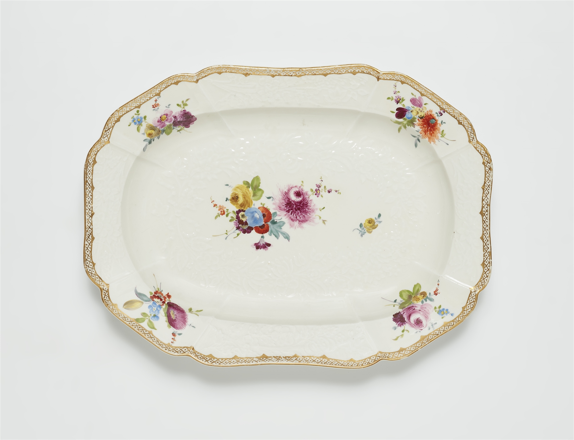 A Meissen porcelain platter from a dinner service with floral decor