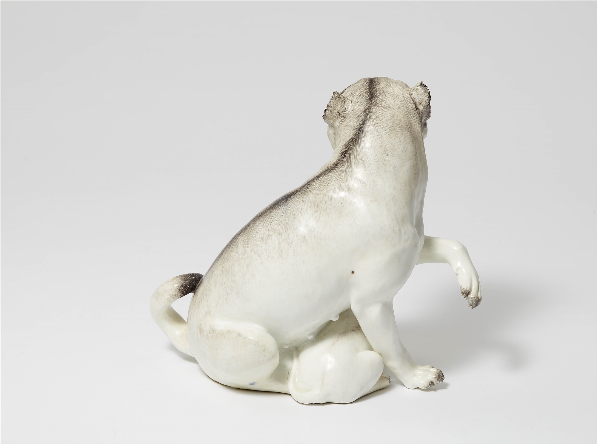 A large Meissen porcelain model of a pug dog and pup - Image 2 of 2