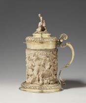 A museum-quality, silver gilt mounted ivory tankard