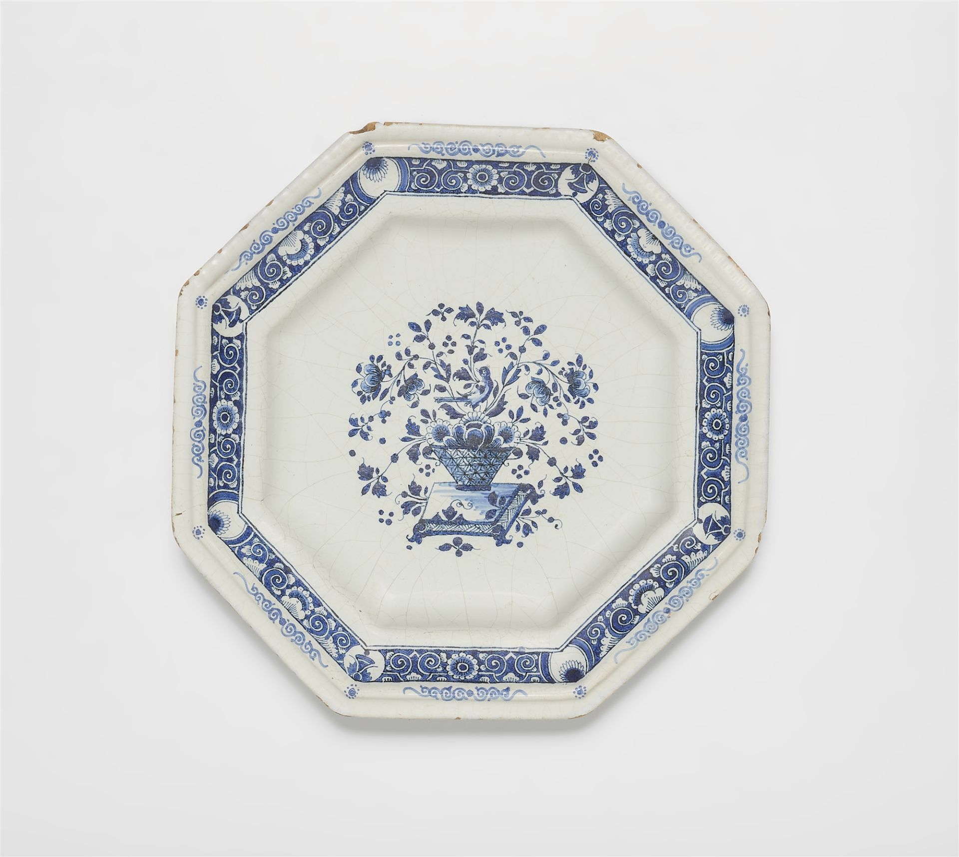 An octagonal Strasbourg faience dish with lambrequin decor