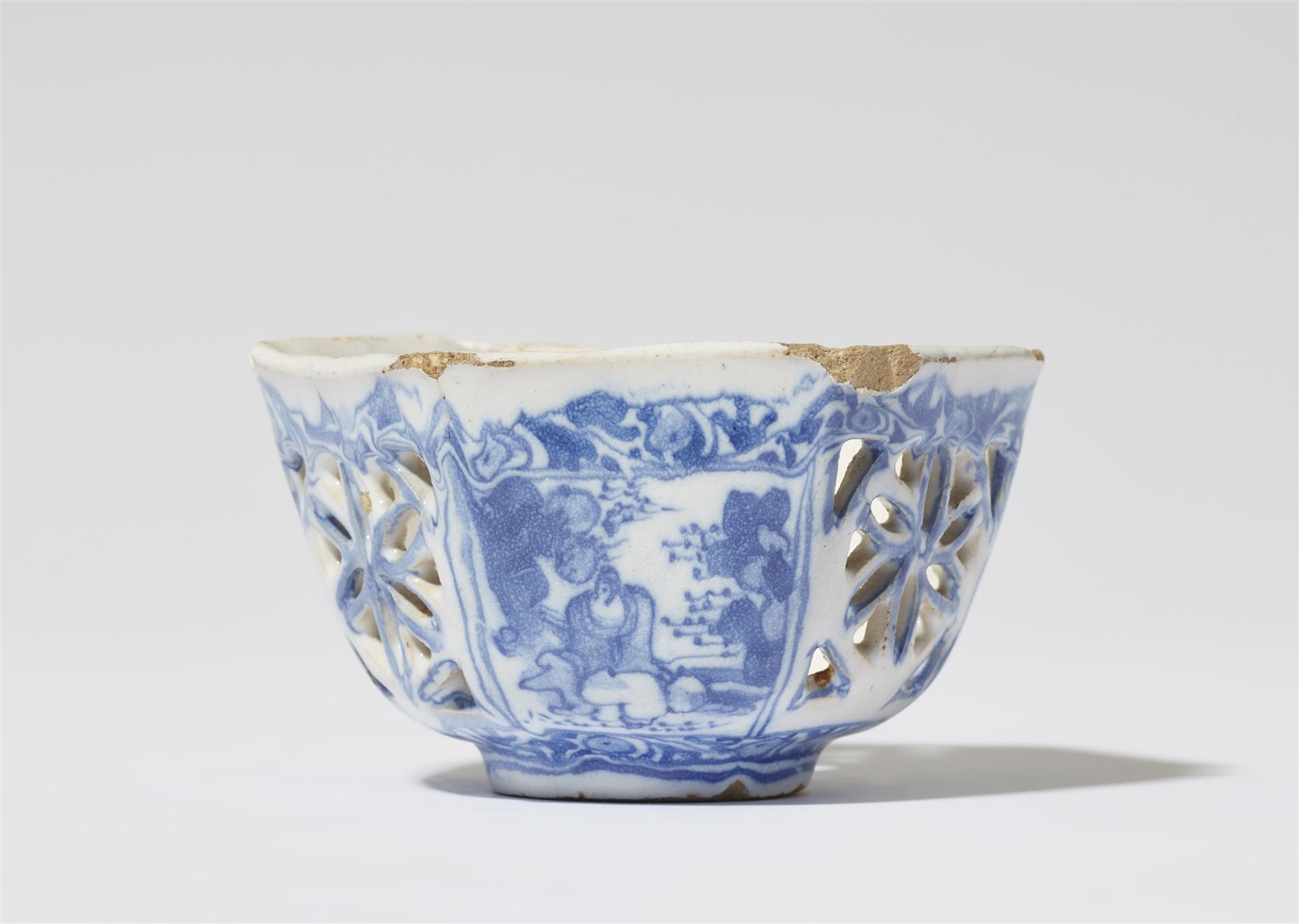 An openwork faience bowl