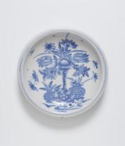 A faience dish with a still life motif