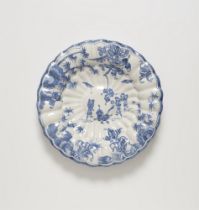 A rare faience fan dish with a "Spanish Chinoiserie"