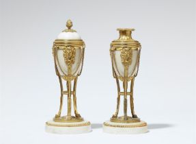 A pair of Louis XVI cassolettes