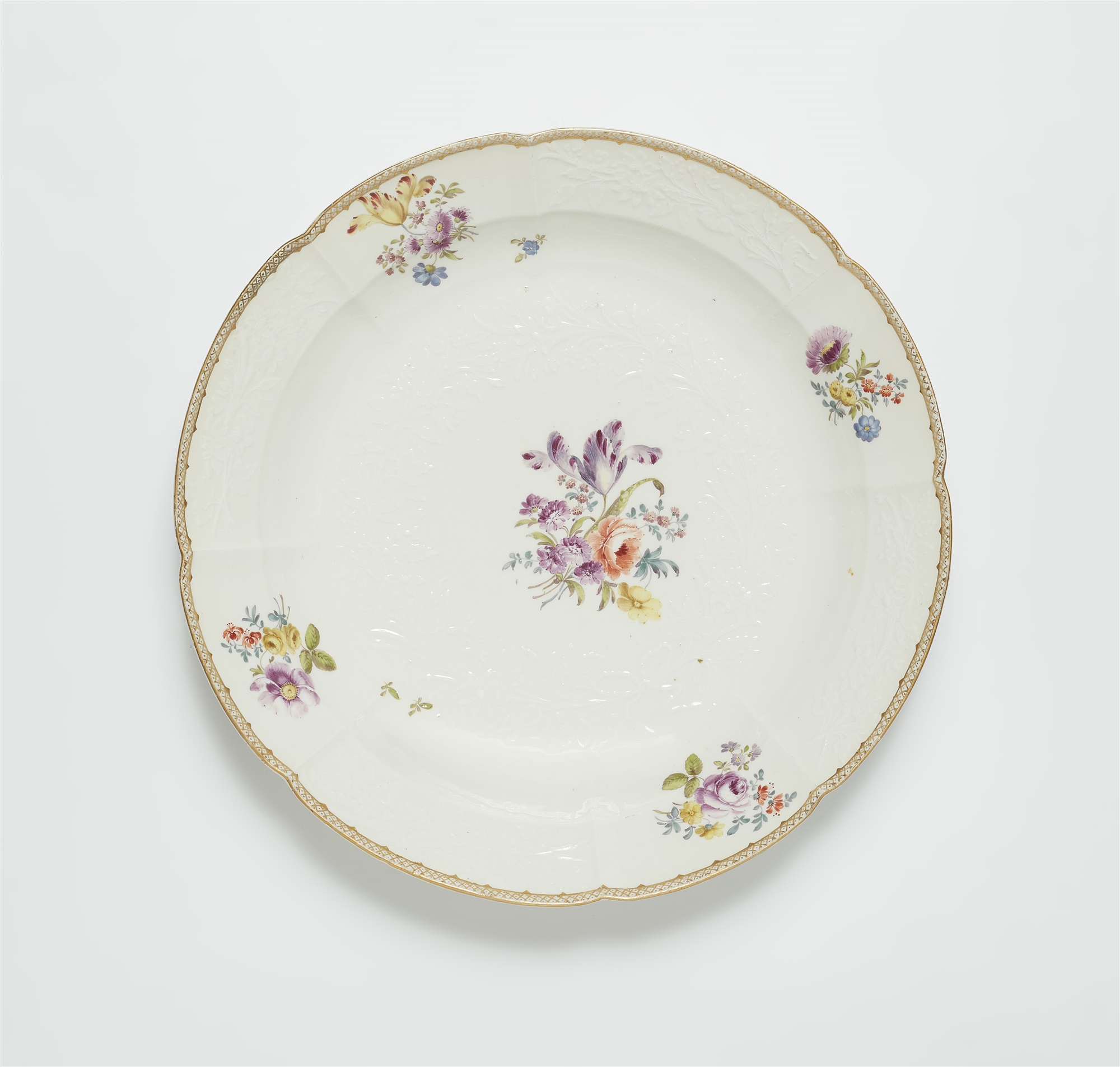 A Meissen porcelain dish from a dinner service with naturalistic flowers