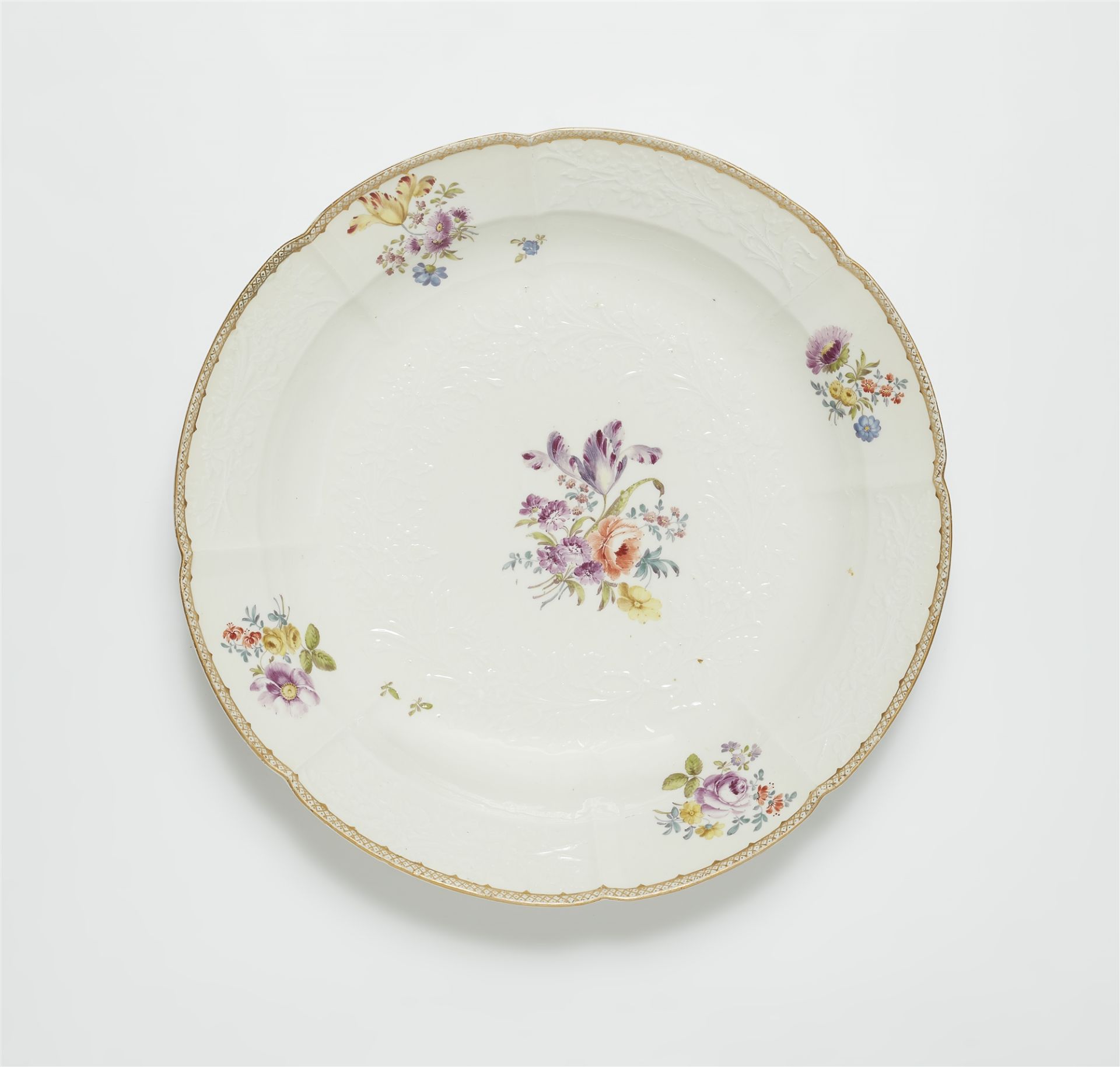 A Meissen porcelain dish from a dinner service with naturalistic flowers
