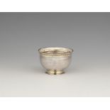 A small silver beaker