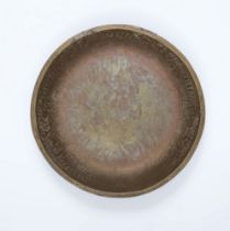 A Romanesque engraved bronze dish