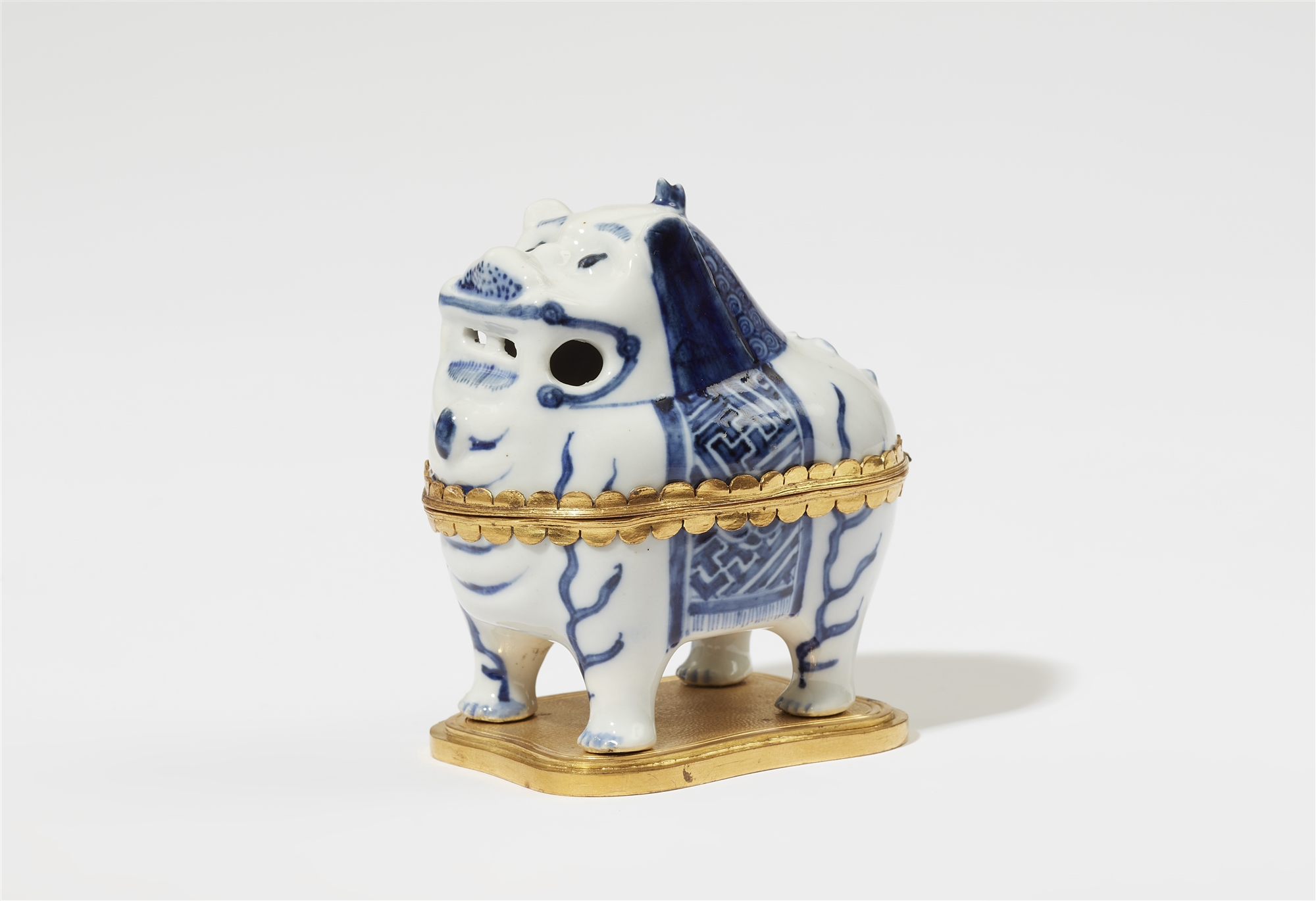 A Chinese Wanli porcelain luduan incense burner in ormolu mountings