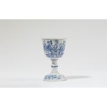 A rare faience goblet with "swamp flower" motifs