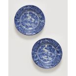 A pair of large Delftware dishes with Chinoiserie decor