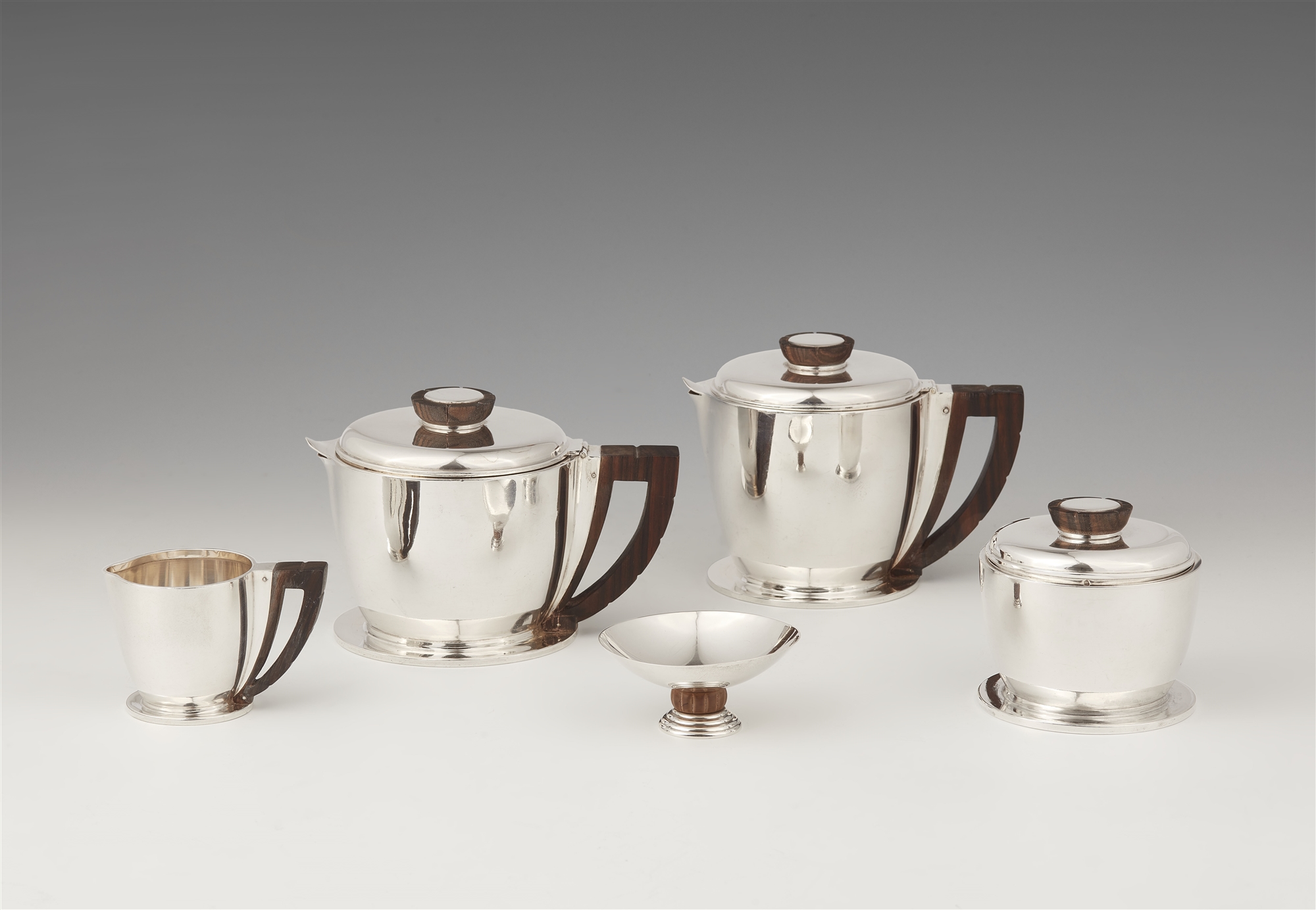 A silver tea and coffee service made by Jean-Emile Puiforcat