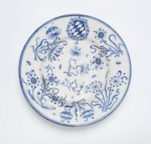 A Hanau faience dish with the coat of arms of the Bavarian prince electors