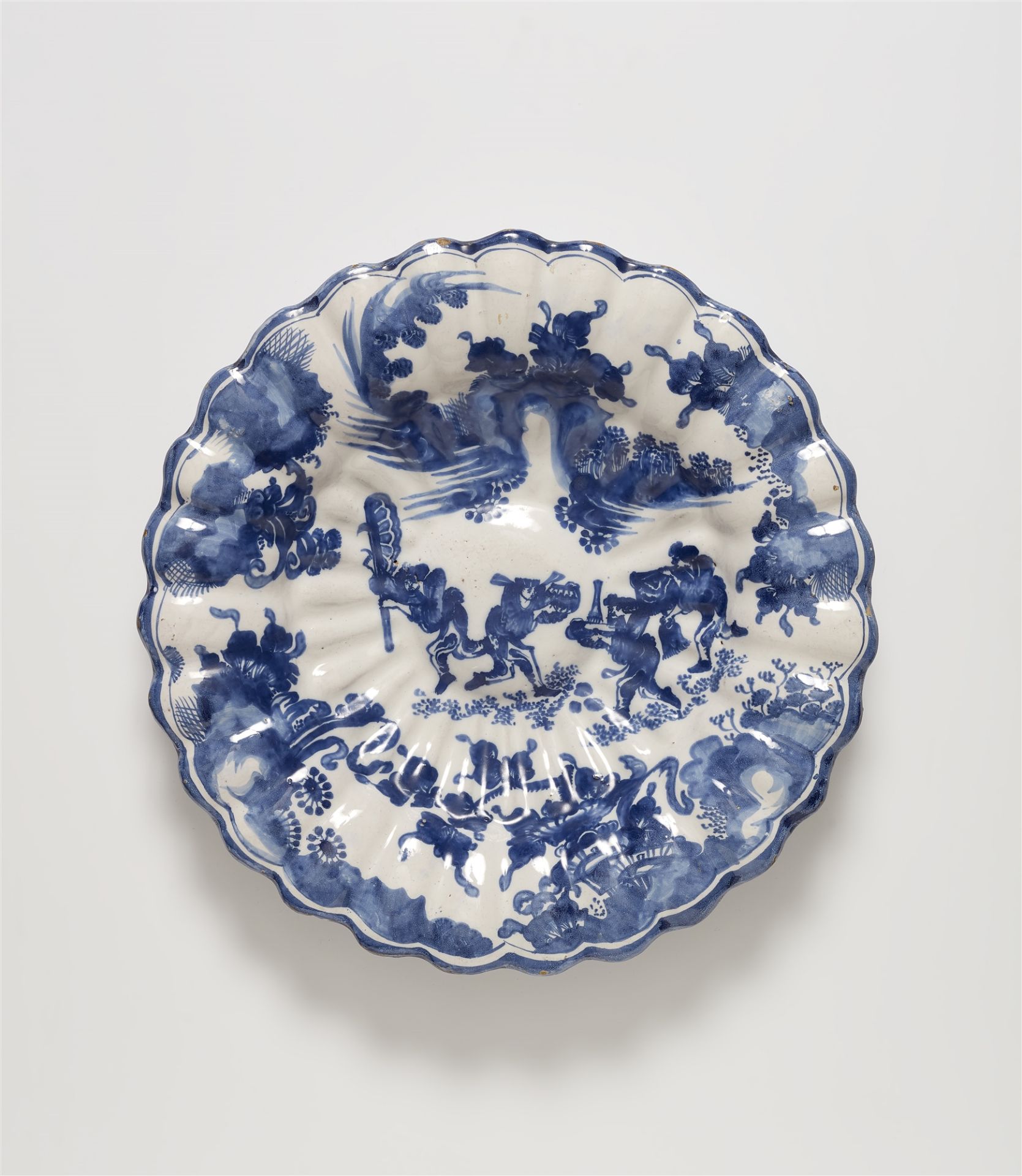 A rare faience fan dish with a "Spanish Chinoiserie"