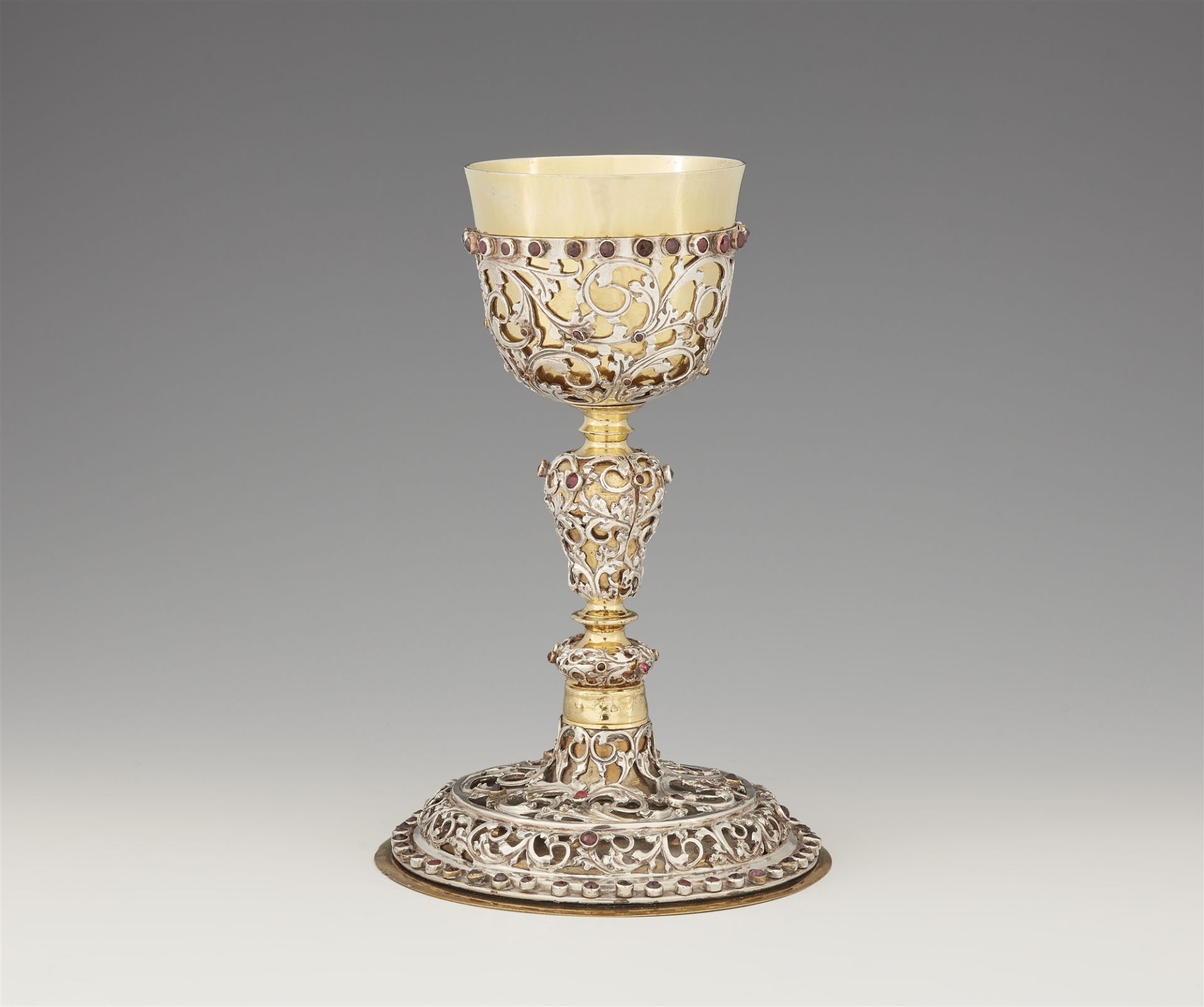 A Bohemian brass and silver communion chalice in the original case