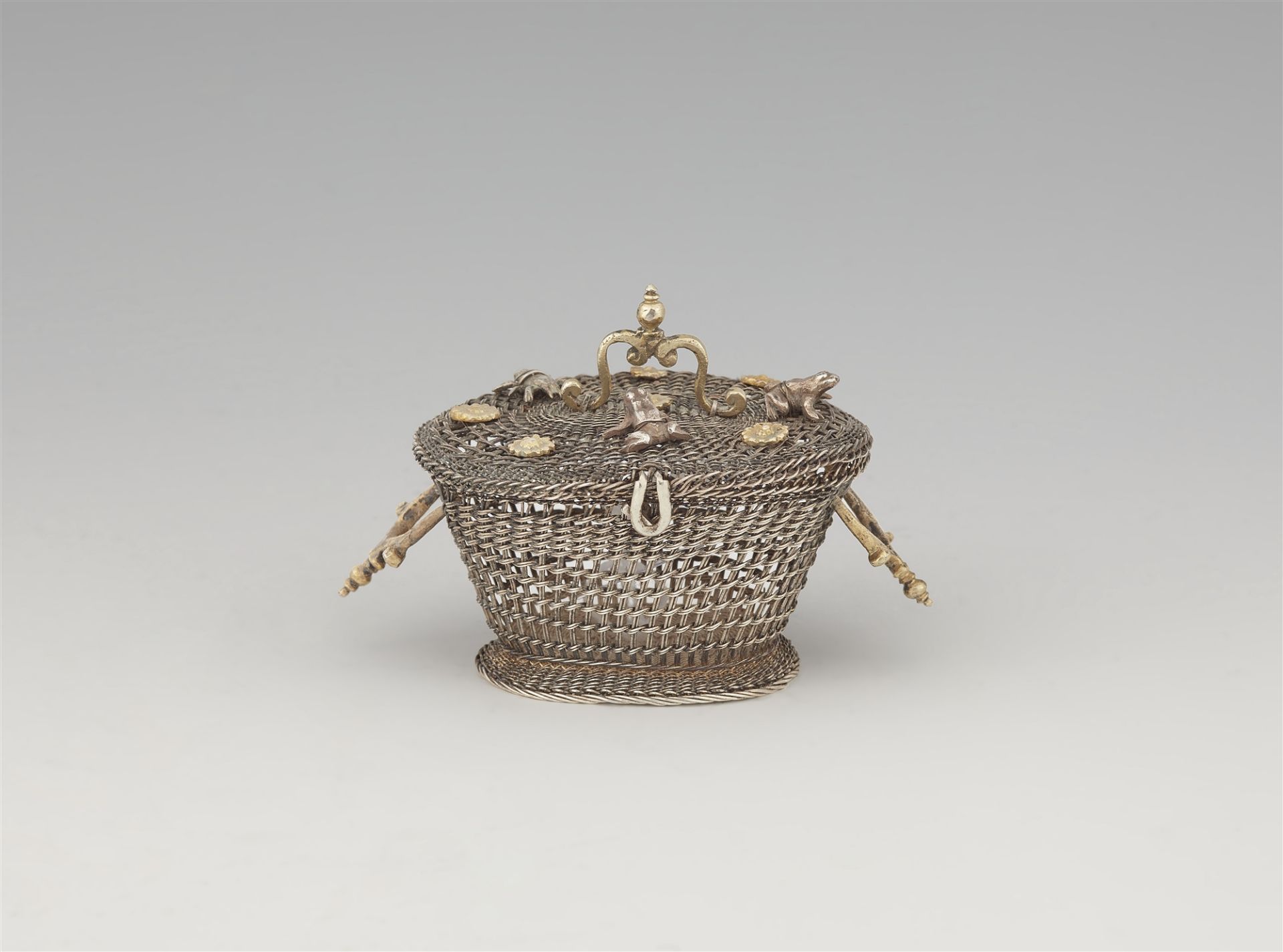 A parcel gilt Renaissance silver miniature basket