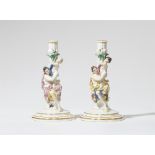 Two figural Meissen porcelain candlesticks