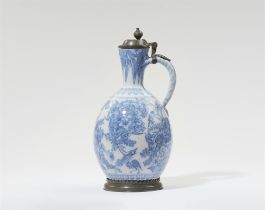 A faience jug with "swamp flower" motifs