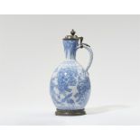 A faience jug with "swamp flower" motifs