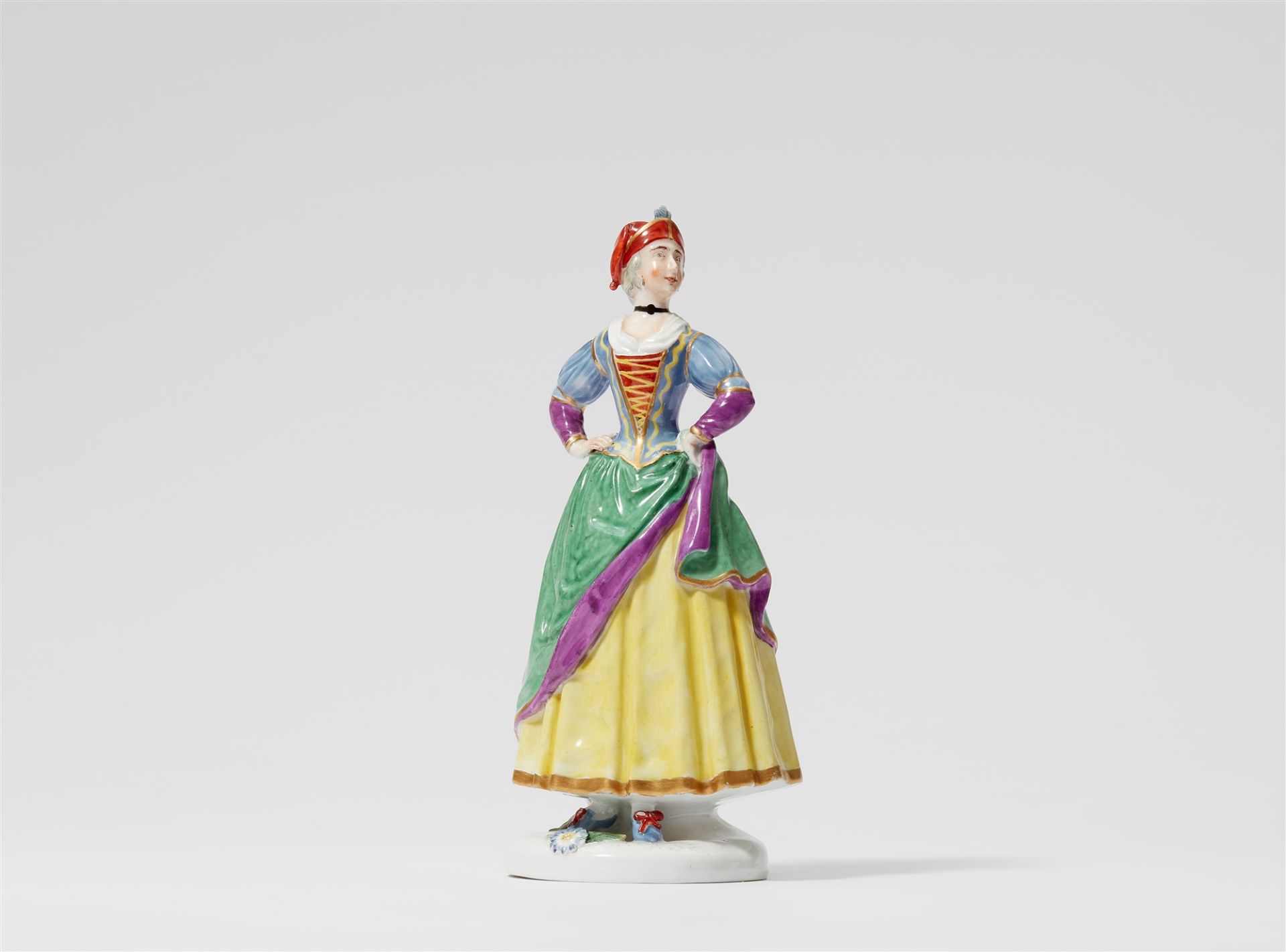 A rare Fürstenberg porcelain figure of Ragonda from the Commedia Dell'arte