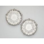 A pair of George IV silver salvers