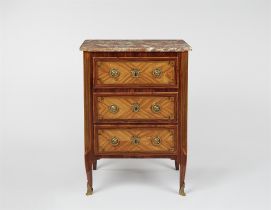 A Louis XVI style chest of drawers