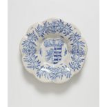 An important Frankfurt faience dish with the royal Saxon coat of arms