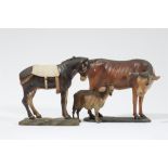 Models of a cow, donkey, and goat from a Nativity scene