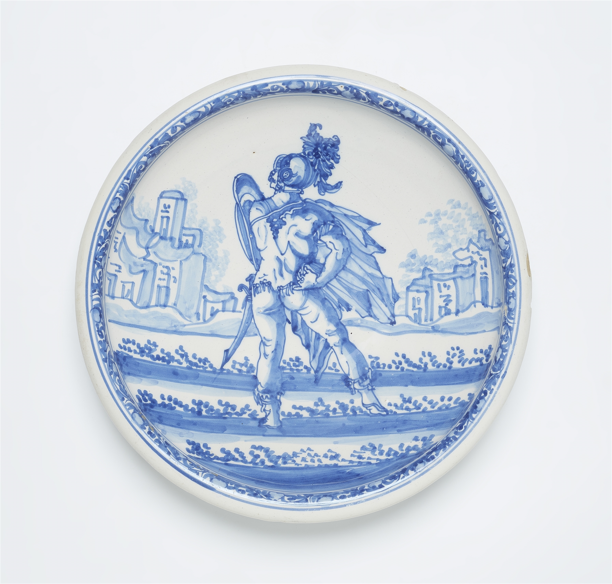 A faience dish with a soldier motif