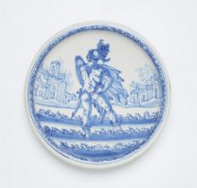 A faience dish with a soldier motif