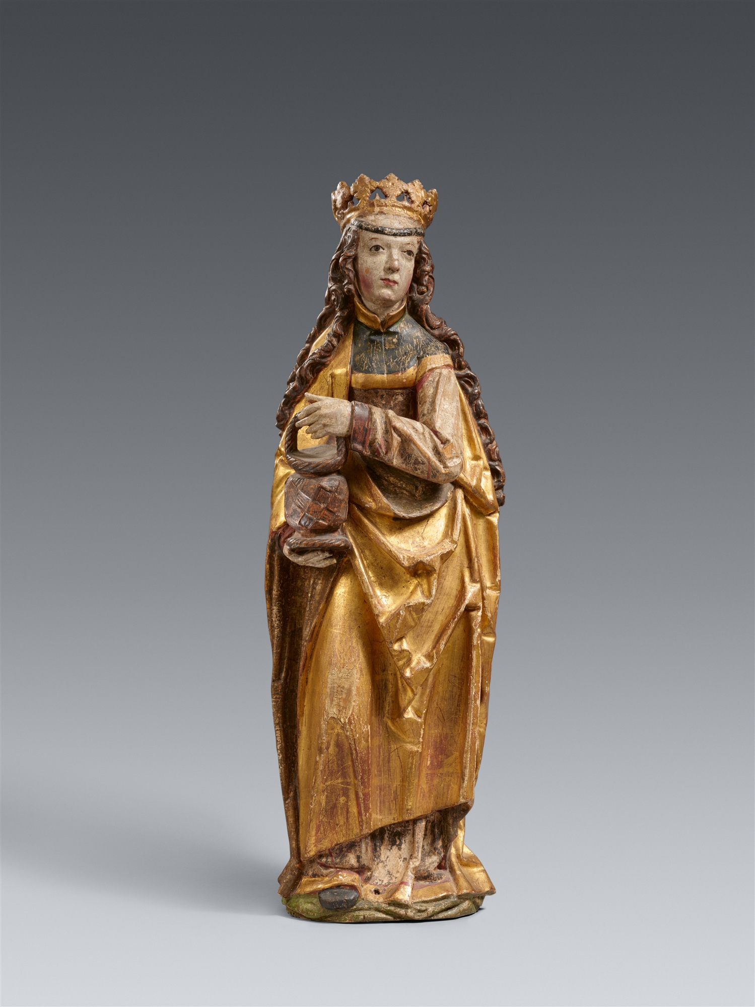 A carved limewood figure of St. Dorothy, Thuringia, around 1520