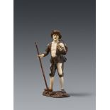 A carved ivory figure of a travelling peddlar, attributed to Simon Troger
