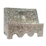 Embossed silver lectern with a wooden core. Novo-Hispanic work. Dated 1657.