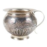 Embossed silver spittoon. Novohispanic or Viceregal work. Mexico or Peru. Late 18th century.