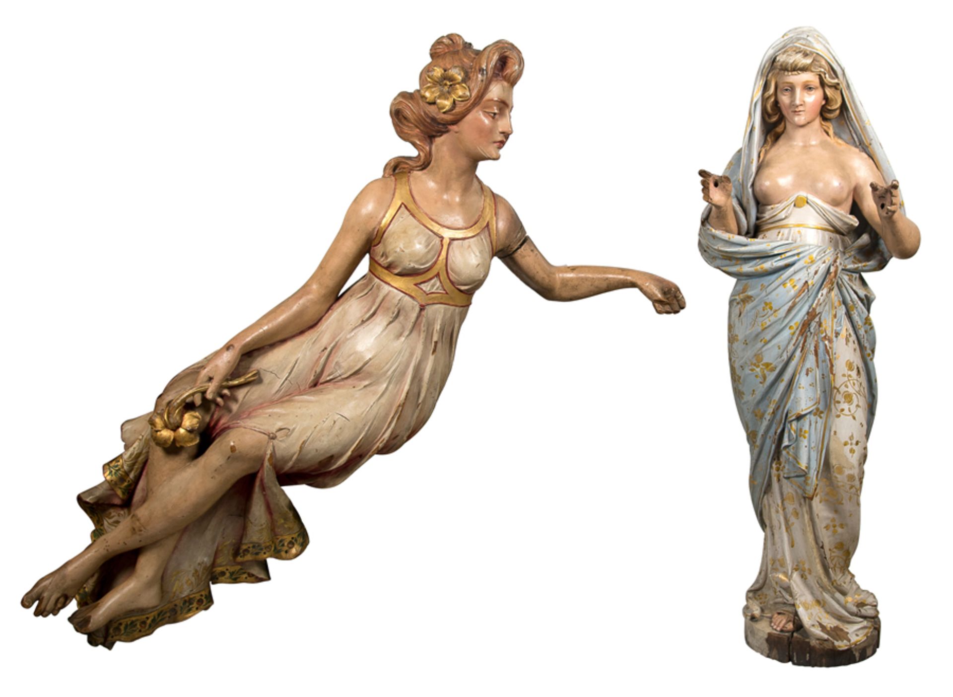 Pair of sculptures in carved and polychrome wood. Art Nouveau. Circa 1900.