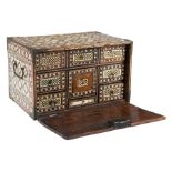 Mughal cabinet in rosewood with engraved bone inlay and polychrome bonewith gilt brass hardware.