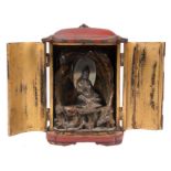 Buddhist Zushi (portable altar) in carved and lacquered wood. Japan. 19th century.